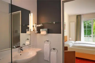 Ein Badezimmer in der Unterkunft Hotel Zielonka