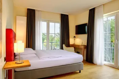 Ein Bett oder Betten in einem Zimmer der Unterkunft Hotel Zielonka