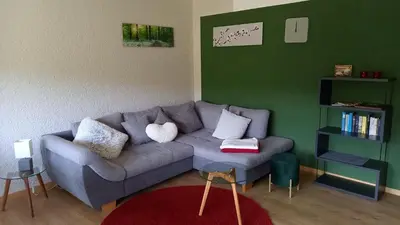 Ein Sitzbereich in der Unterkunft Ferienwohnungen Nibelungenwald