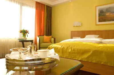 Ein Bett oder Betten in einem Zimmer der Unterkunft Insel-Hotel Heilbronn