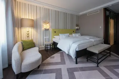 Ein Bett oder Betten in einem Zimmer der Unterkunft Insel-Hotel Heilbronn