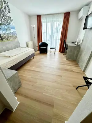 Ein Sitzbereich in der Unterkunft Asgard Hotel
