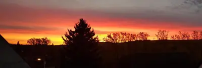 Blick auf den Sonnenuntergang/Sonnenaufgang von der Ferienwohnung aus oder aus der Nähe