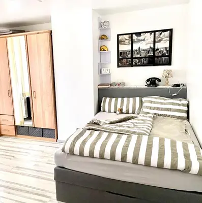 Ein Bett oder Betten in einem Zimmer der Unterkunft Klein aber dein...