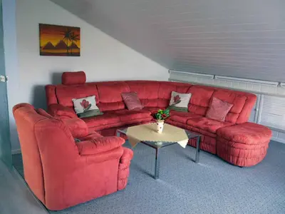 Ein Sitzbereich in der Unterkunft Ferienwohnung Olm