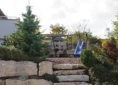 Ein Kinderspielbereich in der Unterkunft Muellers Weingut und Weinstube im Auerberg