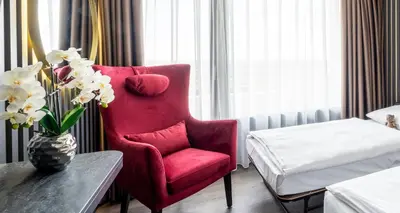 Ein Bett oder Betten in einem Zimmer der Unterkunft PLAZA Hotel Bruchsal