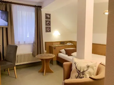 Ein Sitzbereich in der Unterkunft Landhotel Untere Kapfenhardter Mühle