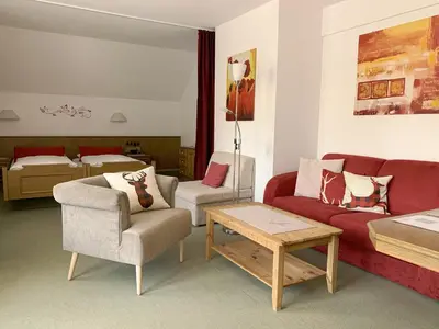 Ein Sitzbereich in der Unterkunft Landhotel Untere Kapfenhardter Mühle