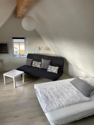 Ein Sitzbereich in der Unterkunft Monteurwohnung Ferienhaus für bis zu 4 Personen
