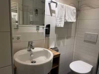 Ein Badezimmer in der Unterkunft Hotel Villa Sulmana