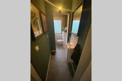 Ein Badezimmer in der Unterkunft SUNSIDE Idyllisches Apartment am Wasser