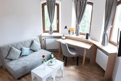 Ein Sitzbereich in der Unterkunft Parkhotel Schillerhain