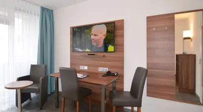 TV/Unterhaltungsangebot in der Unterkunft Neu Heidelberg - Guesthouse & Apartments