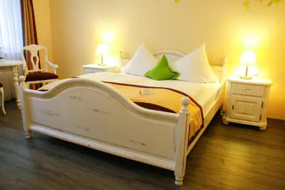 Ein Bett oder Betten in einem Zimmer der Unterkunft Hotel Speeter