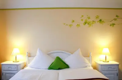 Ein Bett oder Betten in einem Zimmer der Unterkunft Hotel Speeter