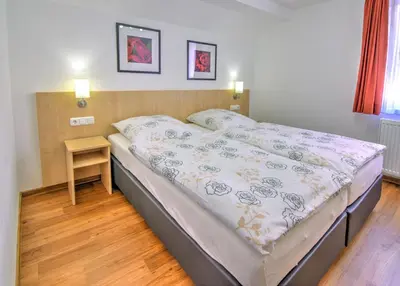 Ein Bett oder Betten in einem Zimmer der Unterkunft Ferienwohnungen in der Wertheimer Altstadt