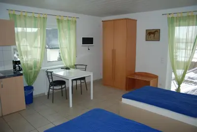 Ein Bett oder Betten in einem Zimmer der Unterkunft Ferienwohnungen Schäfer