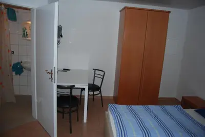 Ein Bett oder Betten in einem Zimmer der Unterkunft Ferienwohnungen Schäfer