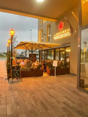 Ein Restaurant oder anderes Speiselokal in der Unterkunft Design Hotel Winterrot