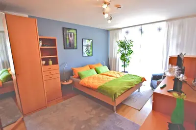 Ein Bett oder Betten in einem Zimmer der Unterkunft Rubin