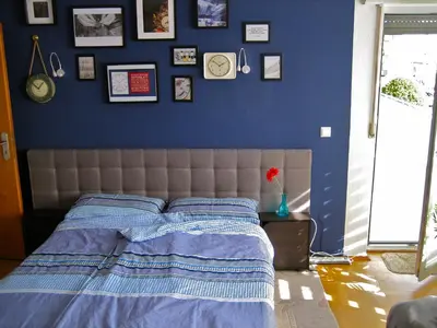 Ein Bett oder Betten in einem Zimmer der Unterkunft Rubin