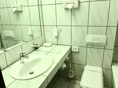 Ein Badezimmer in der Unterkunft Hotel Central