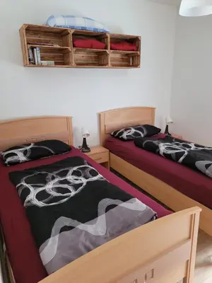 Ein Bett oder Betten in einem Zimmer der Unterkunft Lutzes Ferienhaus