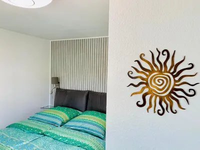 Ein Bett oder Betten in einem Zimmer der Unterkunft AnNa Home & Sunny Home Apartments