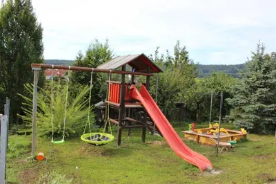 Ein Kinderspielbereich in der Unterkunft Gästehaus Zum Wolffenturm