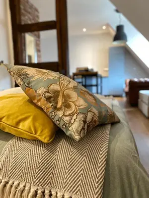 Ein Sitzbereich in der Unterkunft Boutique Apartments & Café am Sonnenhof 1737