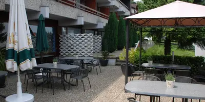 Ein Restaurant oder anderes Speiselokal in der Unterkunft Hotel-Restaurant Sonne