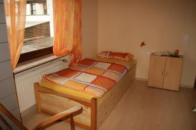 Ein Bett oder Betten in einem Zimmer der Unterkunft Ferienhaus Susanne