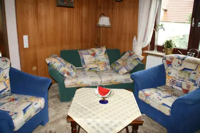 Ein Sitzbereich in der Unterkunft Ferienhaus Susanne