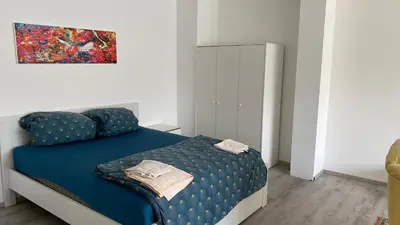 Ein Bett oder Betten in einem Zimmer der Unterkunft Pension Neon