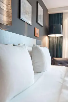 Ein Bett oder Betten in einem Zimmer der Unterkunft Radisson Blu Hotel Karlsruhe