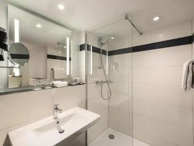 Ein Badezimmer in der Unterkunft Mercure Hotel Mannheim am Friedensplatz