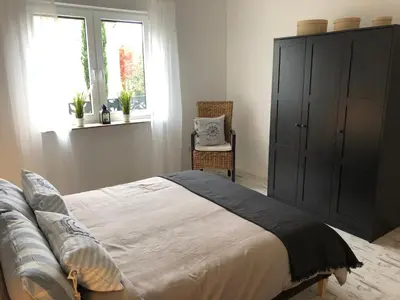 Ein Bett oder Betten in einem Zimmer der Unterkunft Schöne Ferienwohnung nahe Heidelberg