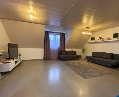 Ein Sitzbereich in der Unterkunft Ferienwohnung Sinsheim