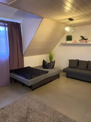 Ein Sitzbereich in der Unterkunft Ferienwohnung Sinsheim