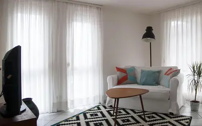 Ein Sitzbereich in der Unterkunft Gemütliche Wohnung mit sonniger Terrasse