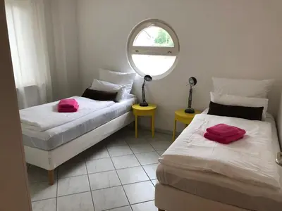 Ein Bett oder Betten in einem Zimmer der Unterkunft Gemütliche Wohnung mit sonniger Terrasse