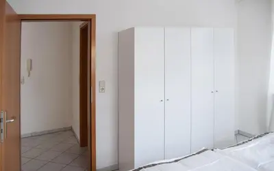 Ein Bett oder Betten in einem Zimmer der Unterkunft Gemütliche Wohnung mit sonniger Terrasse