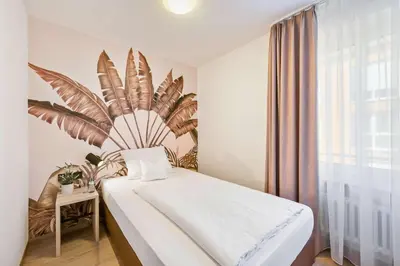 Ein Bett oder Betten in einem Zimmer der Unterkunft Best Western Hotel Favorit