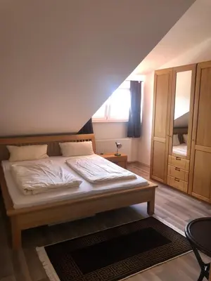 Ein Bett oder Betten in einem Zimmer der Unterkunft Hotel Restaurant Artemis