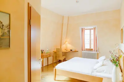 Ein Bett oder Betten in einem Zimmer der Unterkunft Hotel Kollektur