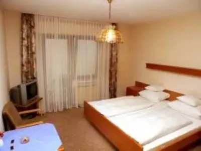 Ein Bett oder Betten in einem Zimmer der Unterkunft Hotel Bürgerstube