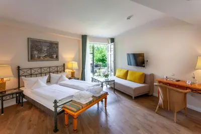 Ein Bett oder Betten in einem Zimmer der Unterkunft Best Western Wein- und Parkhotel