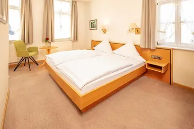Ein Bett oder Betten in einem Zimmer der Unterkunft Hotel Centgraf