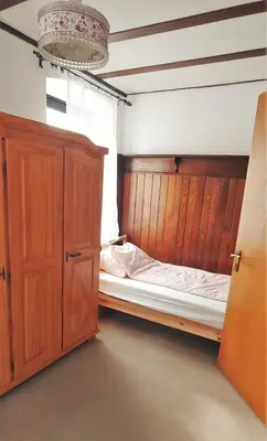 Ein Bett oder Betten in einem Zimmer der Unterkunft Große Wohnung im Odenwald 1